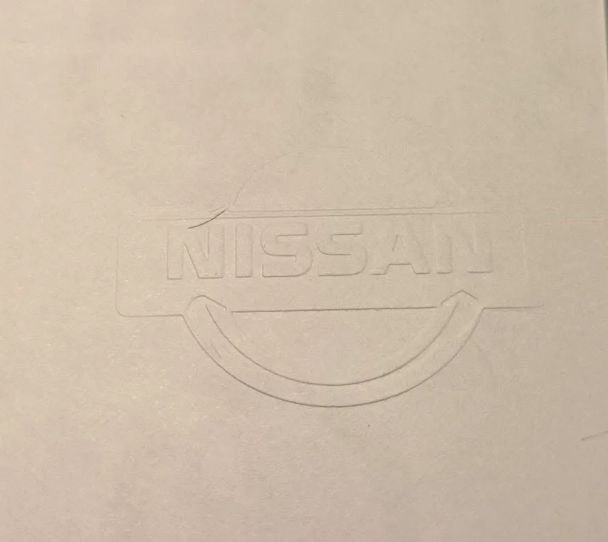Papel seguridad nissan relieve